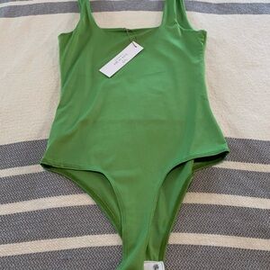 Vibrant Green bodysuit, NWT.
